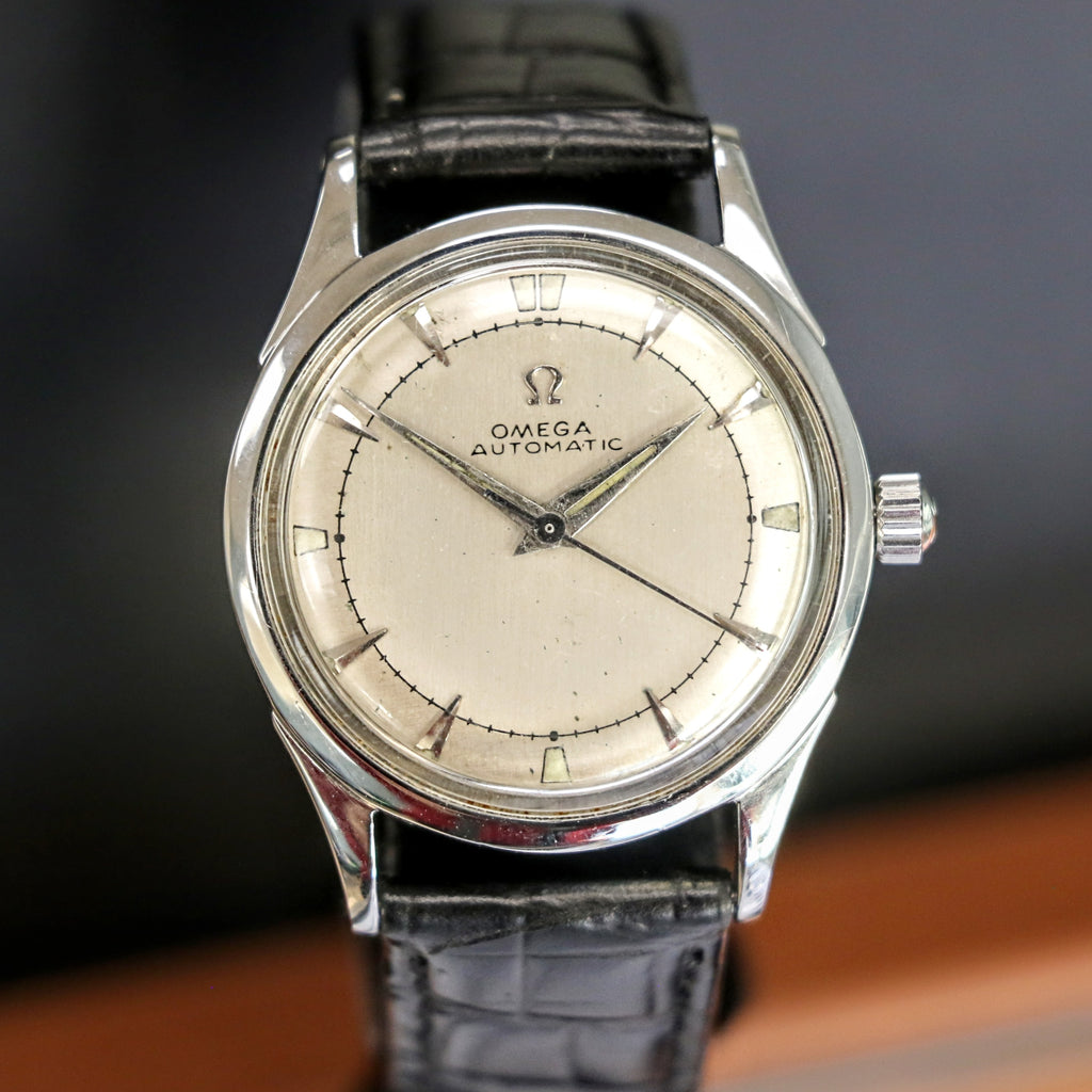 1947 Omega Early Bumper Automatic with Rare Patina Black Dial Model 2582 in Stainless Steel