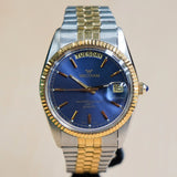 WALTHAM Day/Date Watch Waterresistant 100FT Quartz Wristwatch Blue Dial Two-Tone Case & Flex Band