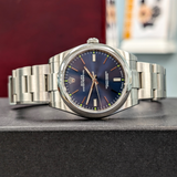 ROLEX Oyster Perpetual 39mm Ref. 114300 Blue Dial Superlative Chronometer Officially Certified Watch