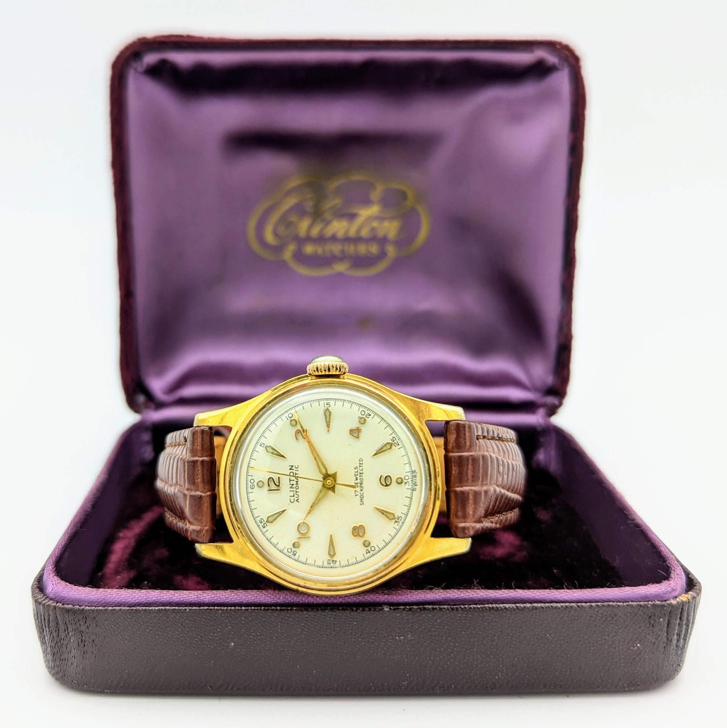 Clinton watch company history cheap